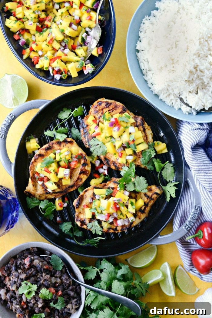 Mojo-Kissed Grilled Chicken with Vibrant Mango Salsa 12 Grilled Cuban Mojo Chicken with Mango Salsa Served