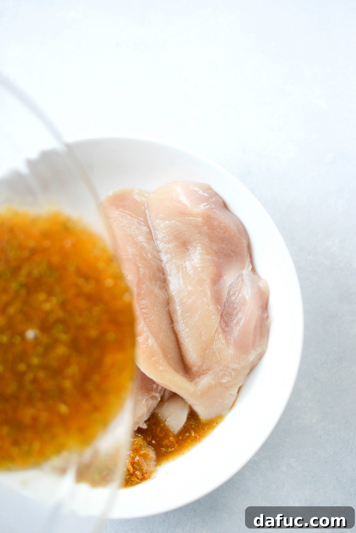 Mojo-Kissed Grilled Chicken with Vibrant Mango Salsa 7 Mixing Mojo Marinade