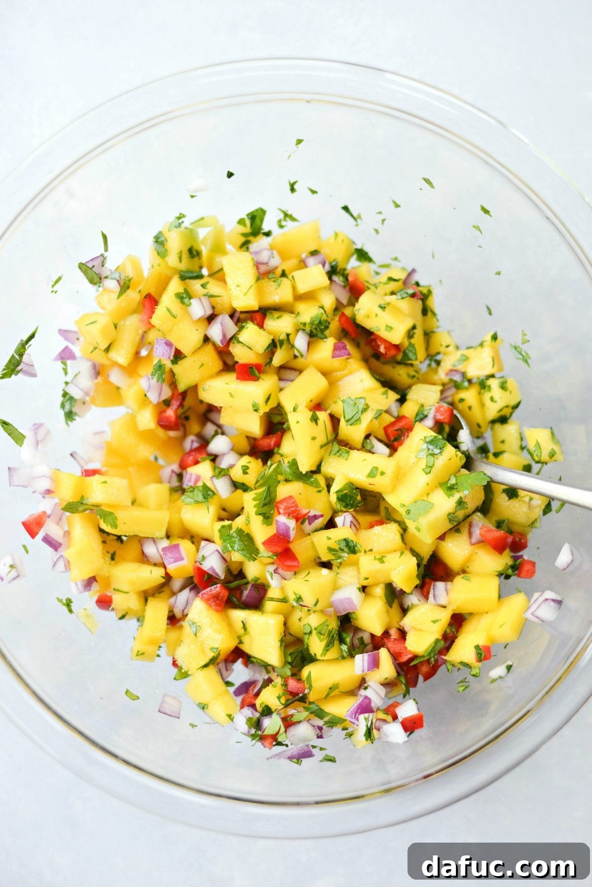 Mojo-Kissed Grilled Chicken with Vibrant Mango Salsa 10 Mixing Fresh Mango Salsa