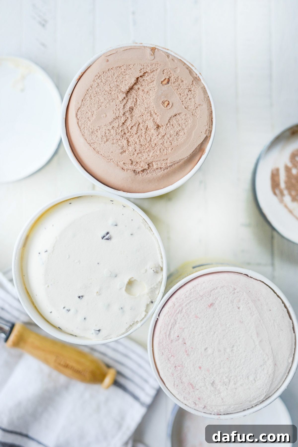 Tillamook ice cream with lids removed, ready for scooping