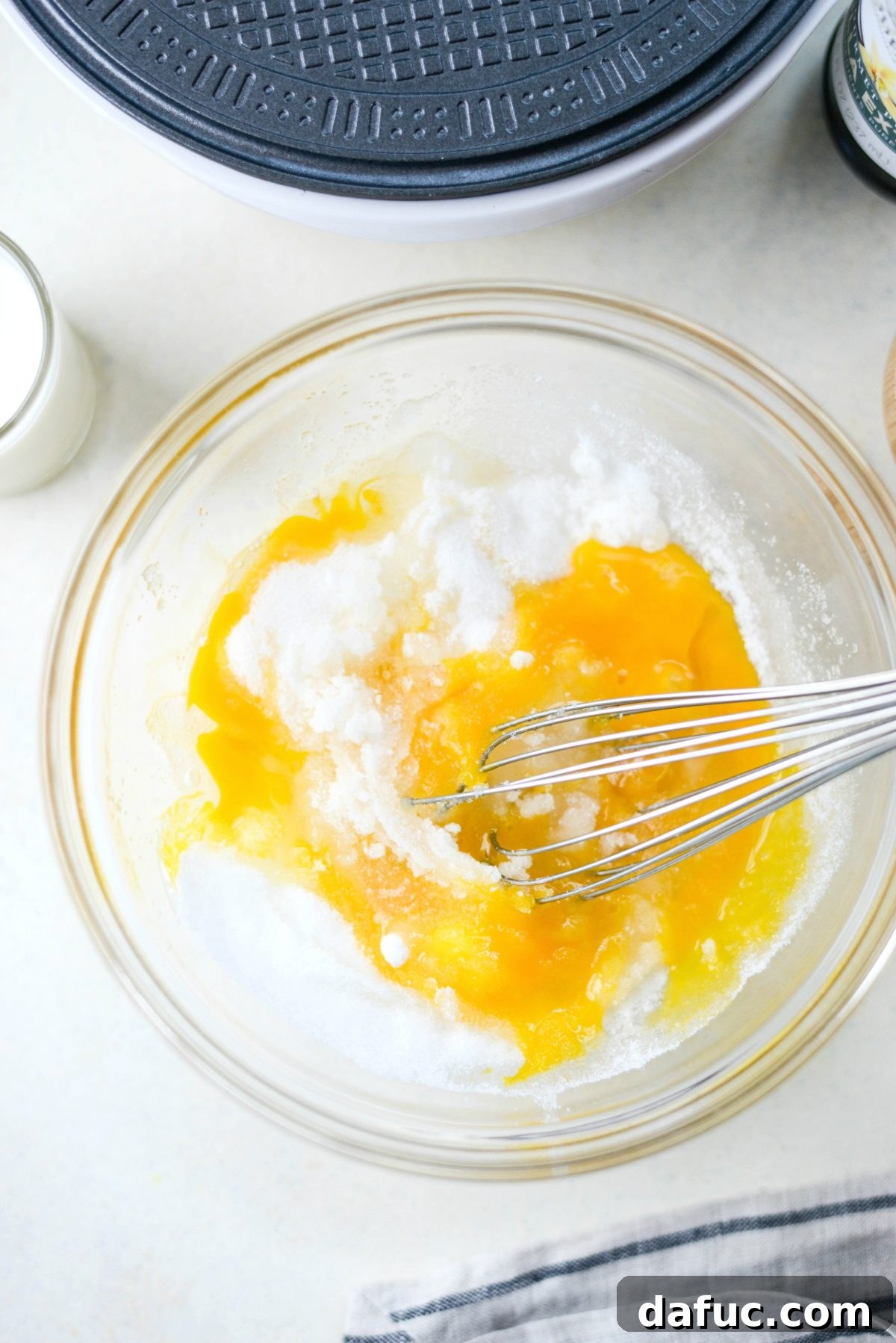 Whisking eggs and sugar together