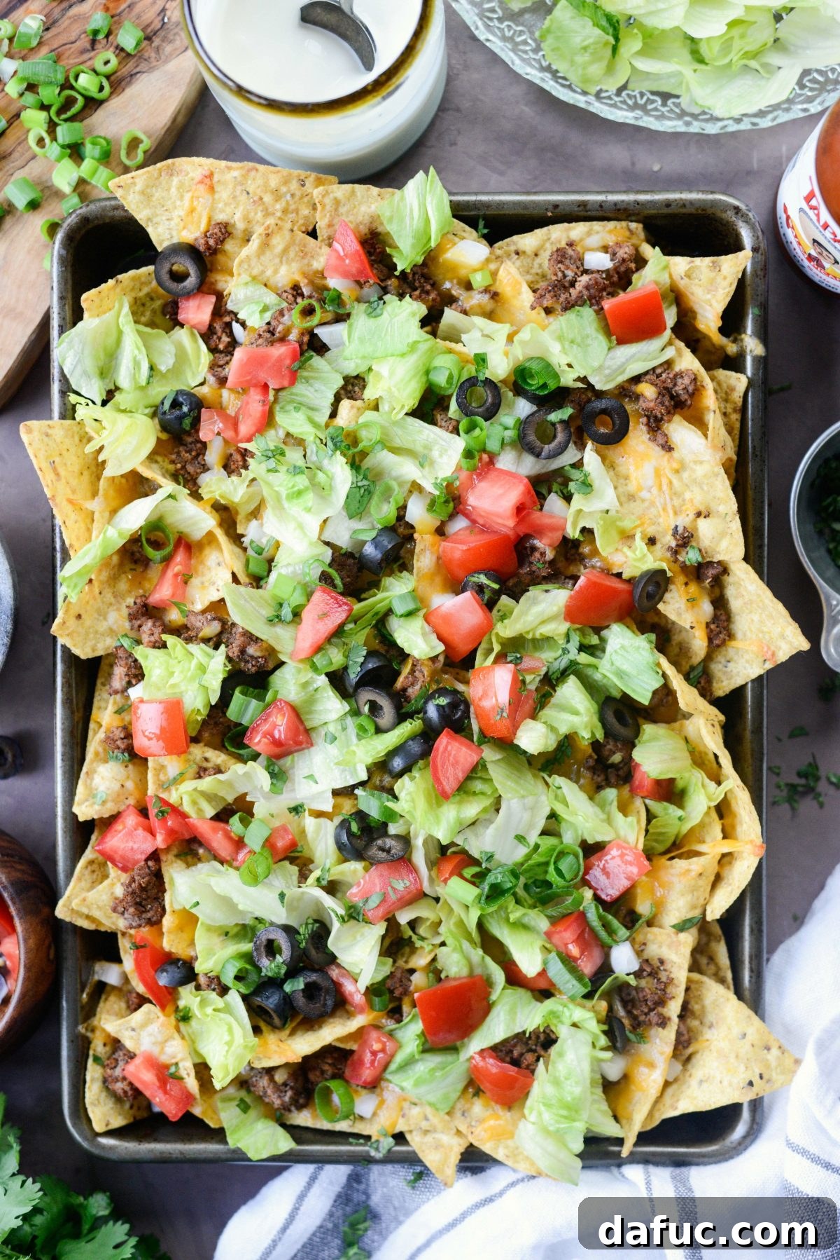 Ultimate Taco Nachos 11 load it up with taco toppings