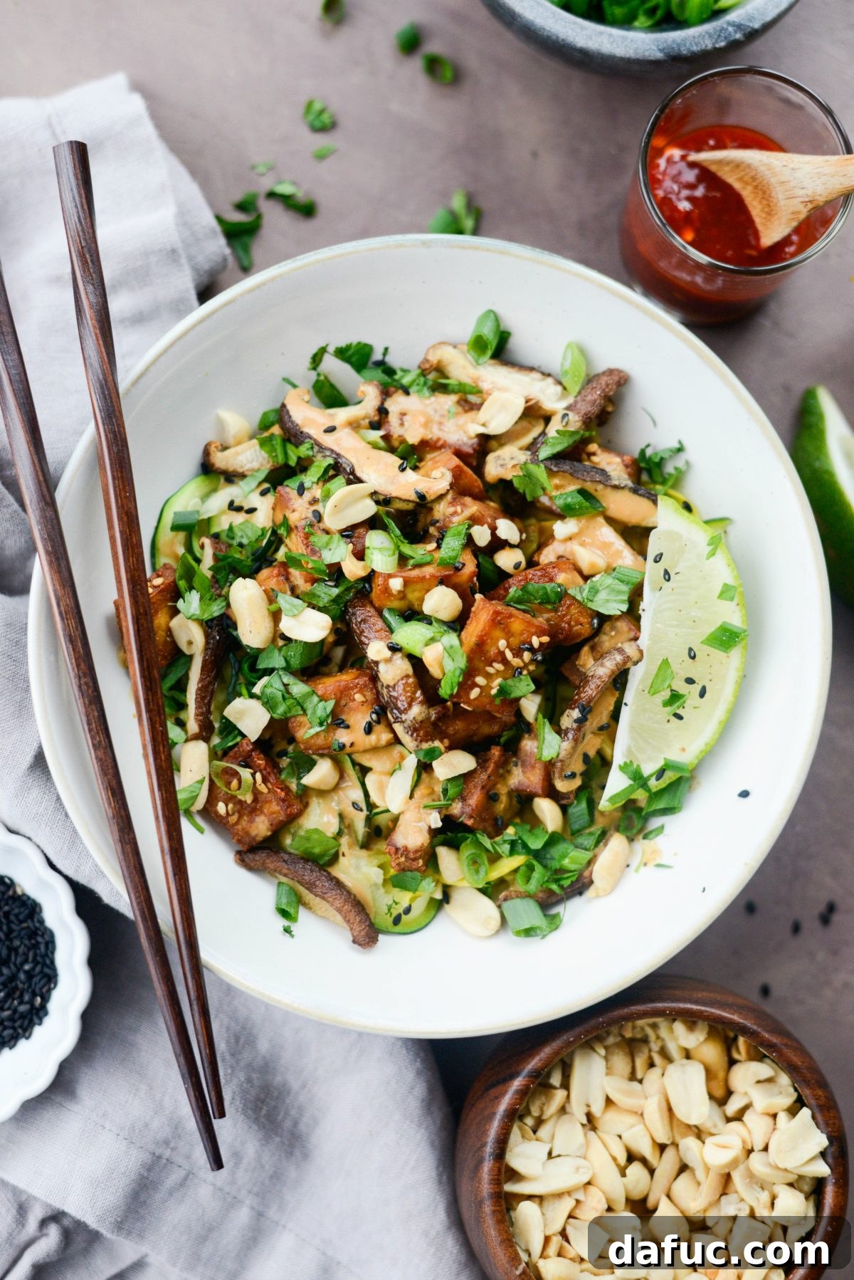 Perfectly Crispy Air Fryer Tofu with Creamy Peanut Sauce 12 Crispy Peanut Tofu with Squash Noodles (Air Fryer) assembled in a bowl