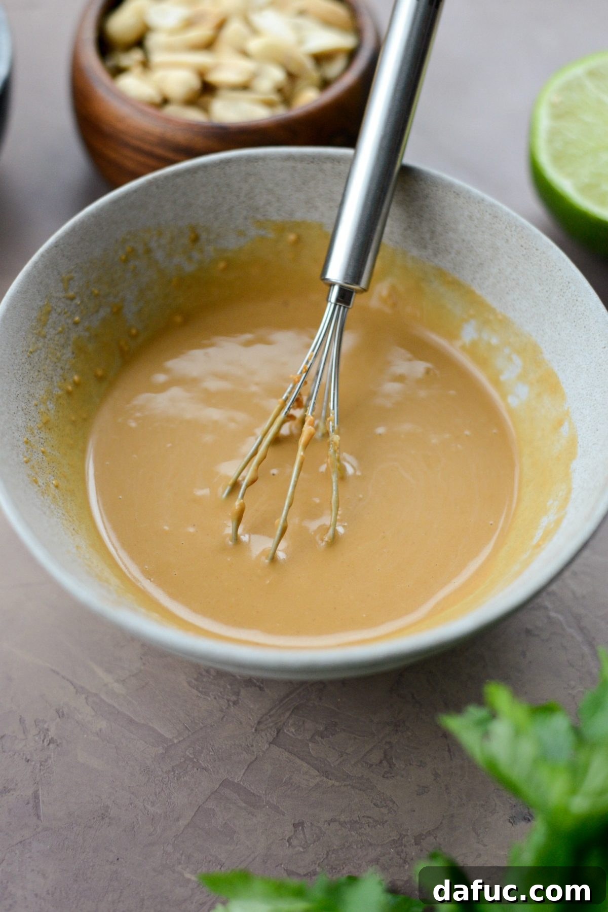 Perfectly Crispy Air Fryer Tofu with Creamy Peanut Sauce 5 Peanut sauce in a bowl