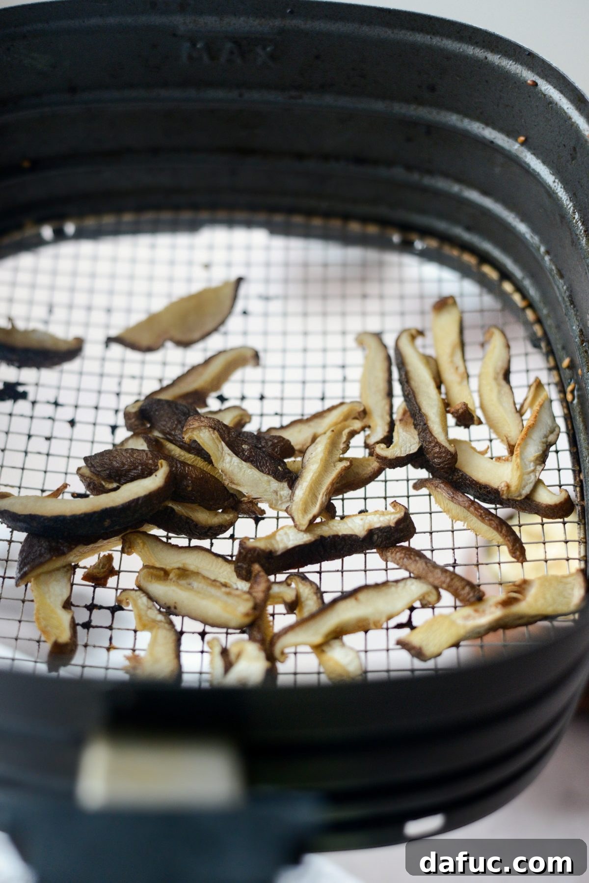 Perfectly Crispy Air Fryer Tofu with Creamy Peanut Sauce 10 Air fried shiitake mushrooms