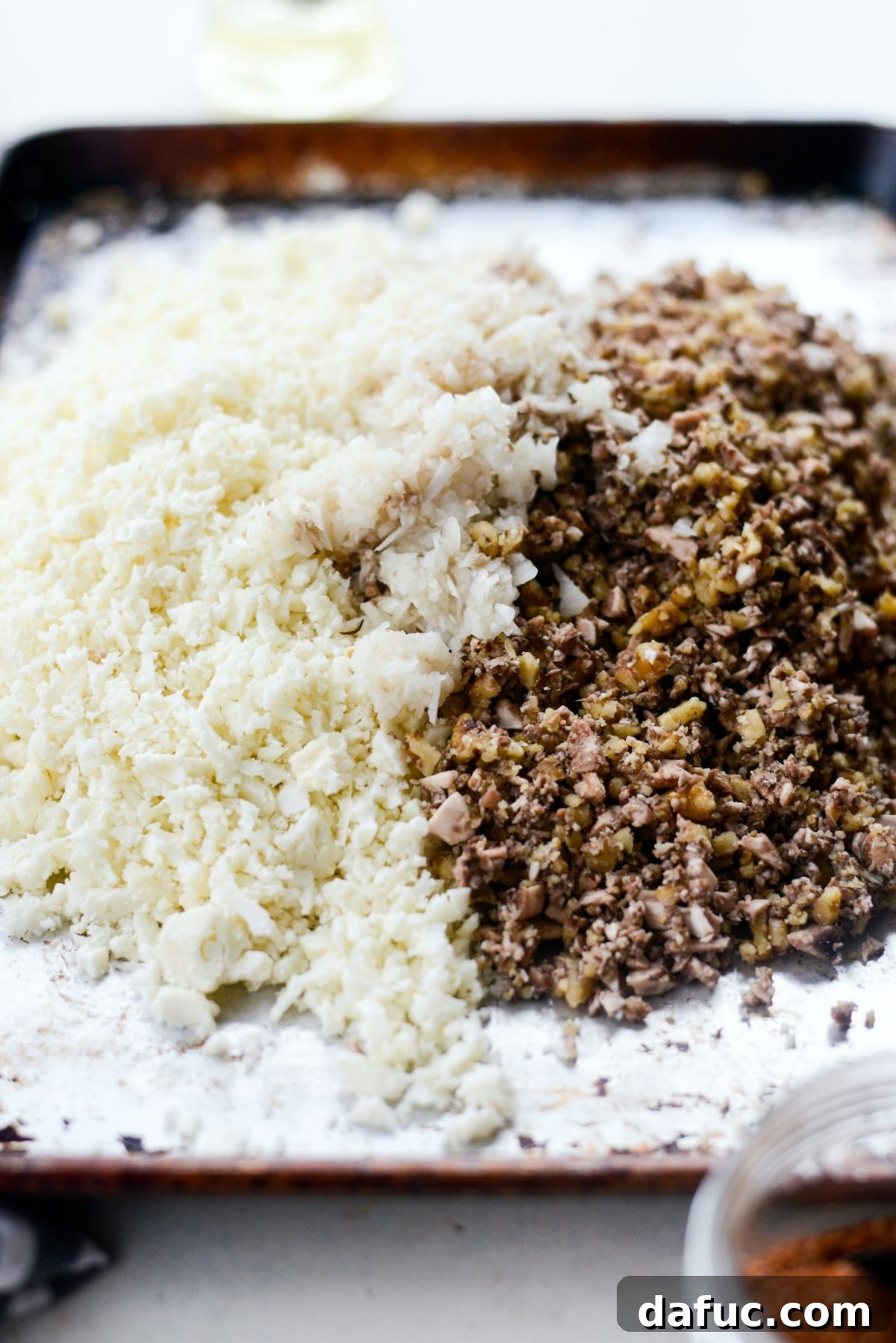 Spiced Cauliflower Taco Crumble 10 Sheet pan with cauliflower, mushroom, walnut, and minced onion mixture