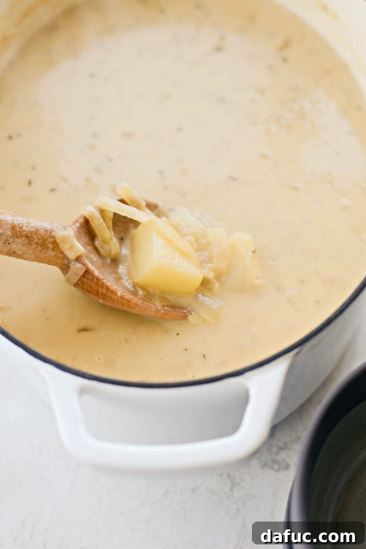 Creamy French Onion Chowder 18 Spoonful of tender potato and caramelized onions from the French Onion Chowder
