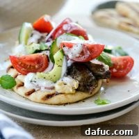 Lamb Kofta Open-Faced Pita, a close-up image of the finished dish