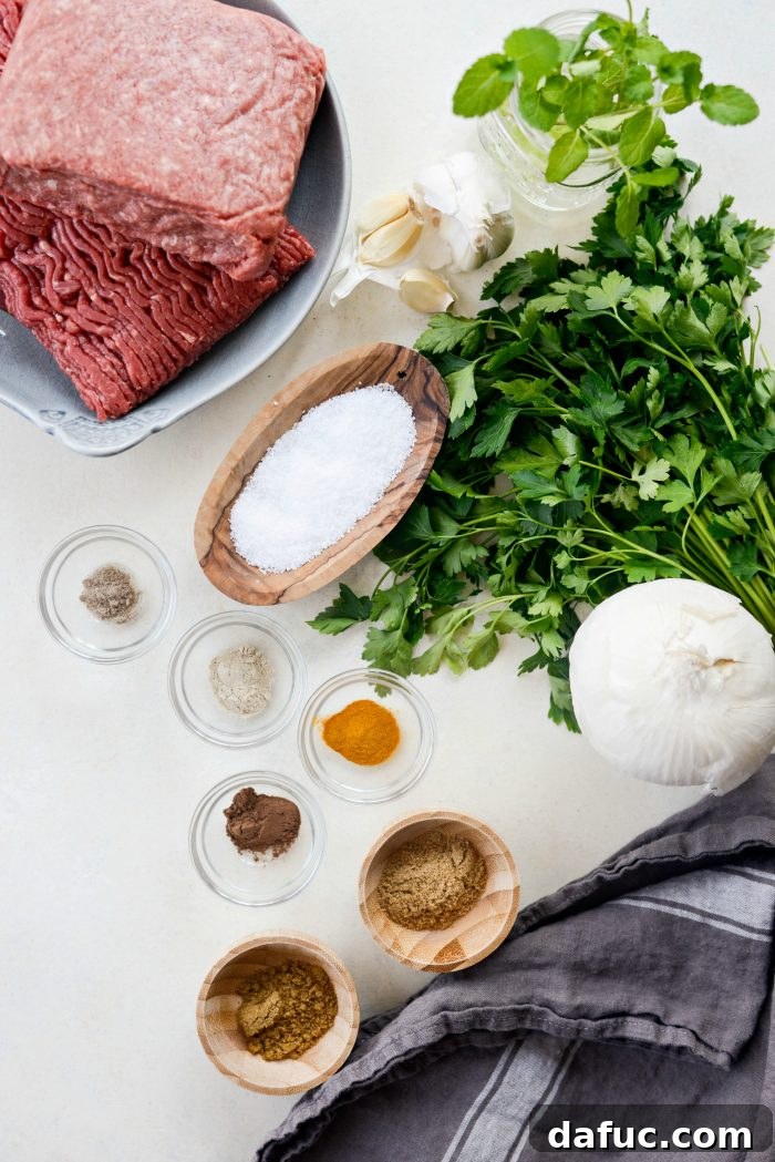 Assortment of fresh ingredients and dry spices for Lamb Kofta Open-Faced Pita recipe