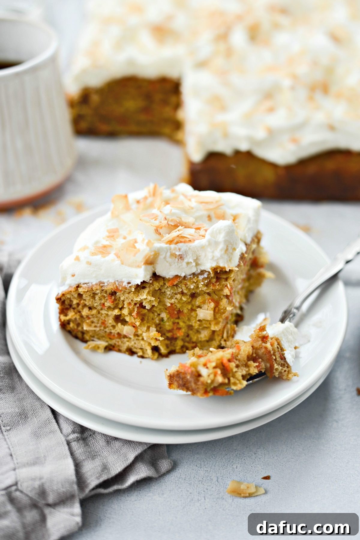 Warmly Spiced Coconut Chai Carrot Cake with Mascarpone Frosting 2 Toasted Coconut Chai Carrot Cake with Mascarpone Frosting l SimplyScratch.com #coconut #carrot #cake #chai #easter #carrotcake #mascarpone #frosting