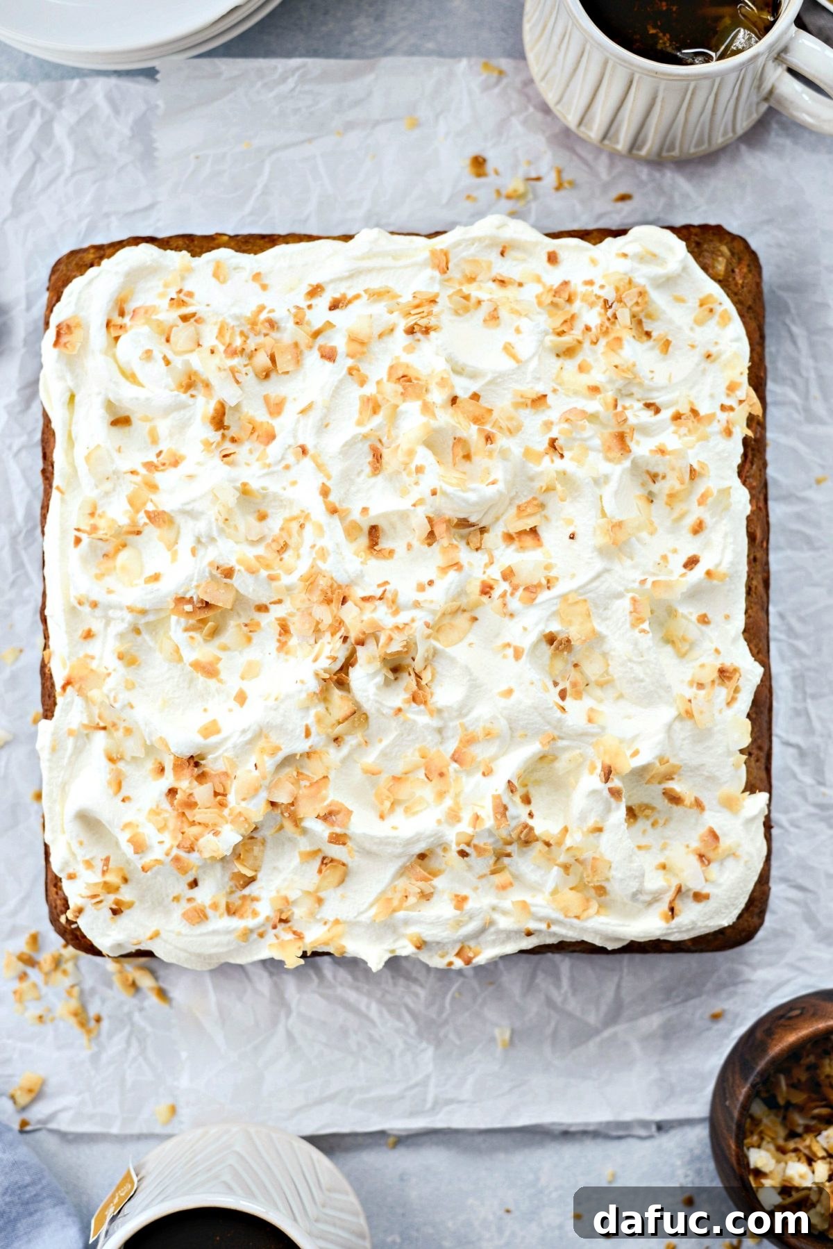Warmly Spiced Coconut Chai Carrot Cake with Mascarpone Frosting 24 Spread mascarpone frosting and top with more toasted coconut.