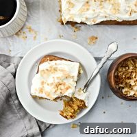 Toasted Coconut Chai Carrot Cake with Mascarpone Frosting l SimplyScratch.com #coconut #carrot #cake #chai #easter #carrotcake #mascarpone #frosting