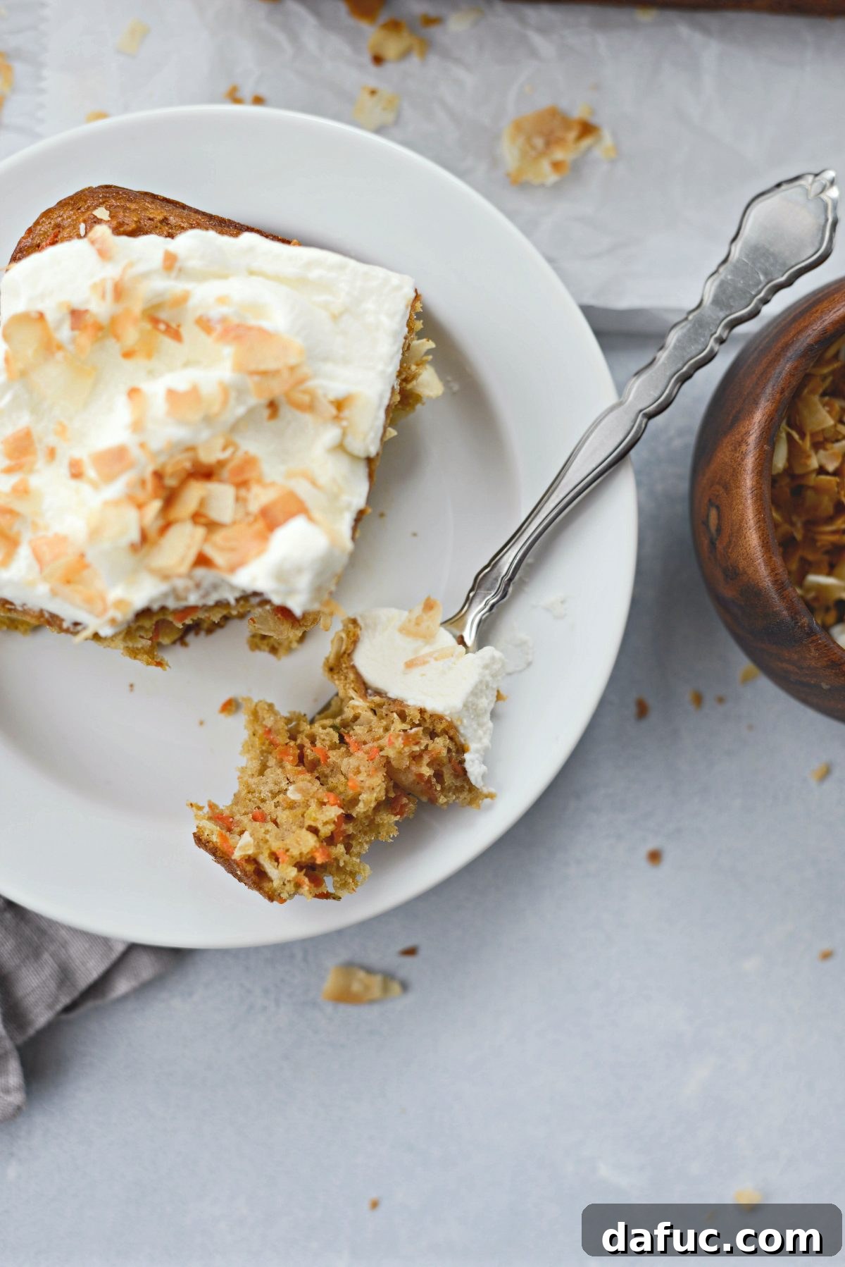 Warmly Spiced Coconut Chai Carrot Cake with Mascarpone Frosting 30 bite of Carrot Cake with Mascarpone Frosting bite.