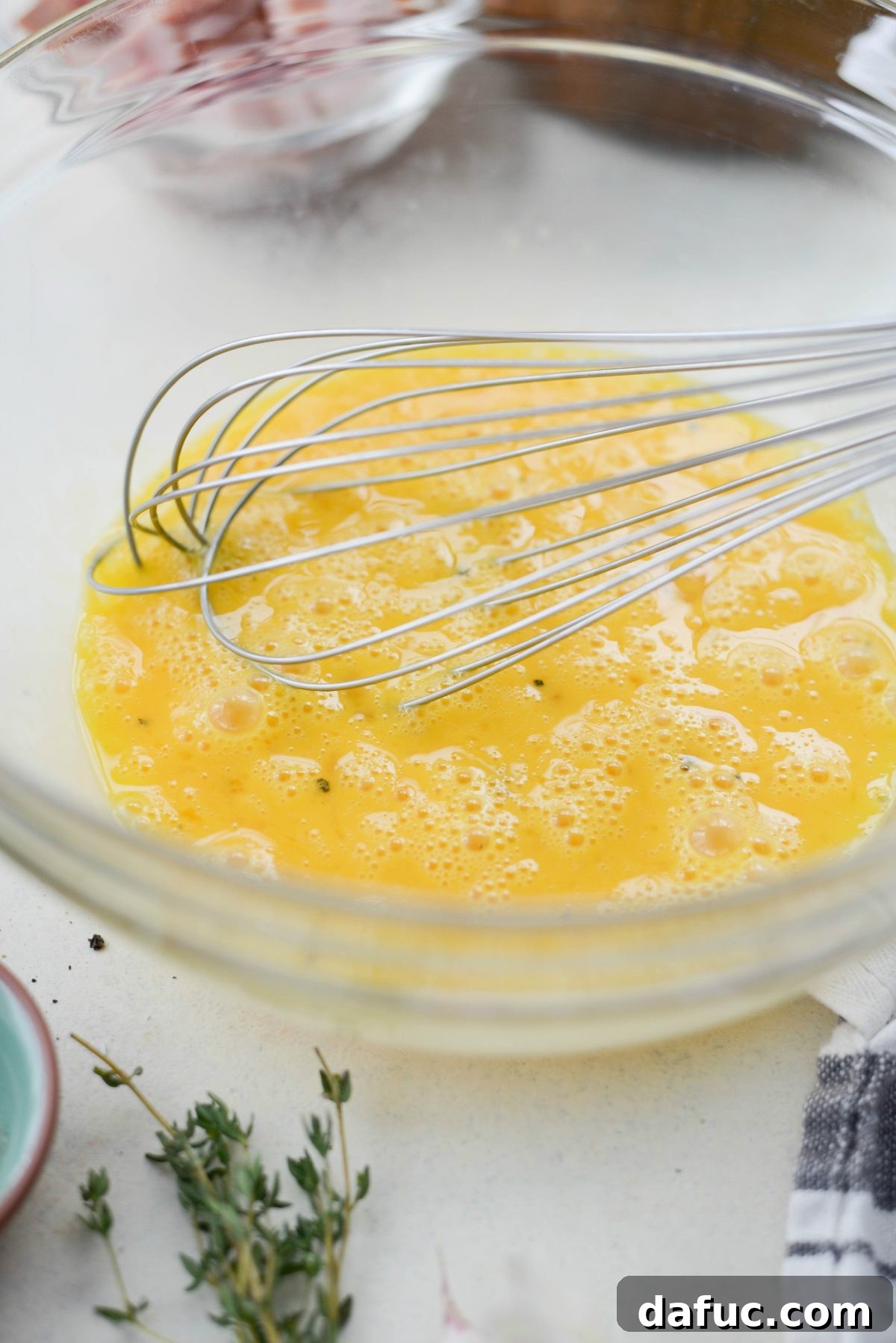 Wholesome Ham, Swiss and Broccoli Quiche 12 Whisking and beating eggs until thick and frothy