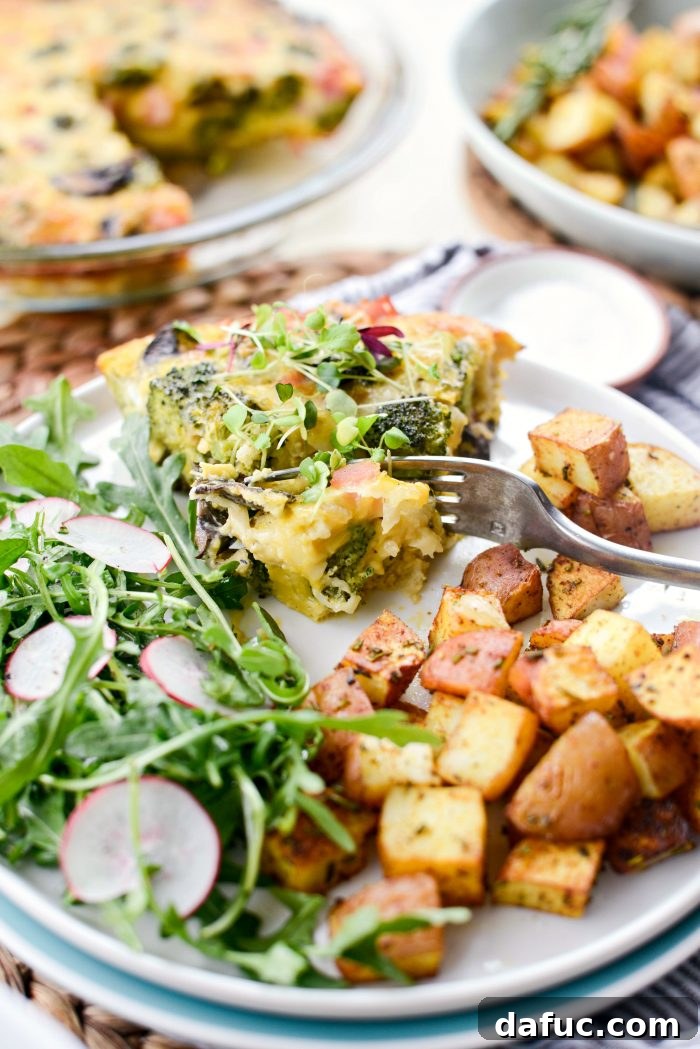 Wholesome Ham, Swiss and Broccoli Quiche 20 Close-up of the delicious Broccoli Ham and Swiss Crustless Quiche, showcasing its textures and ingredients