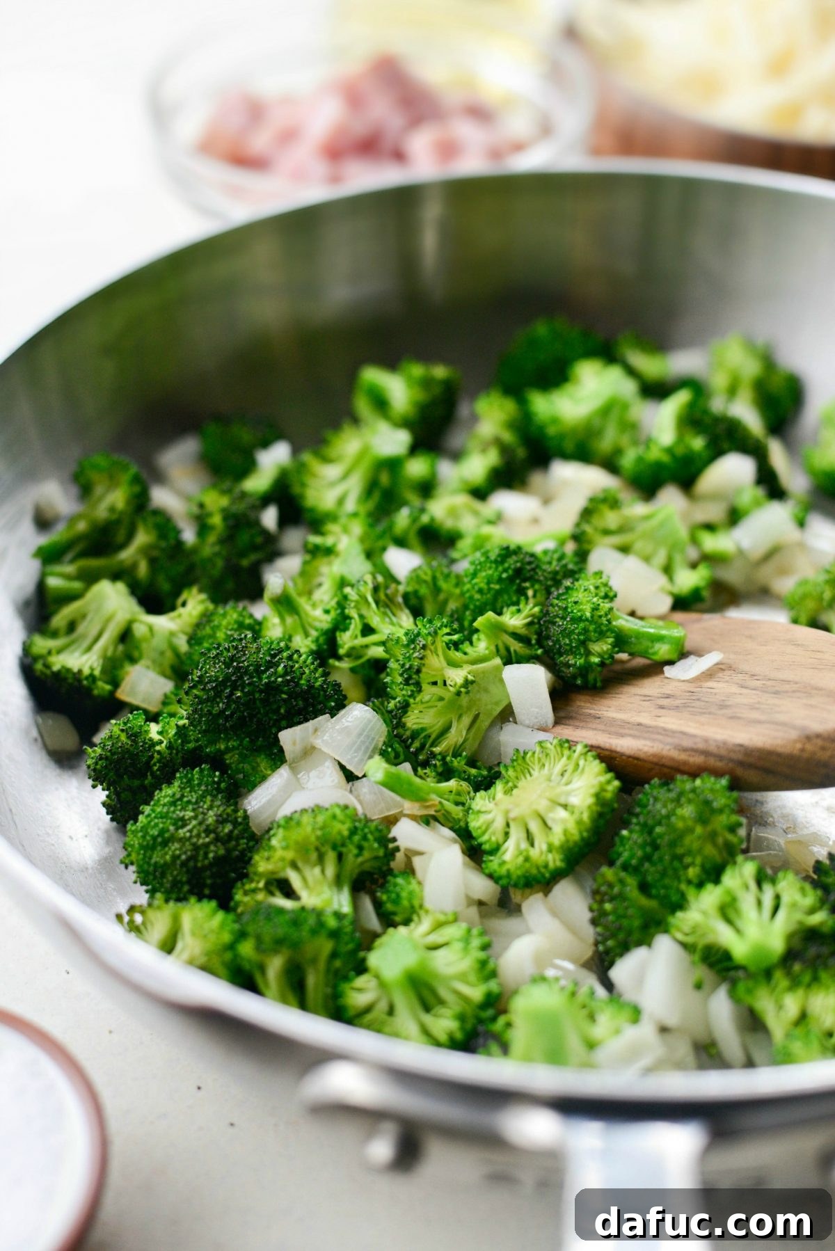 Wholesome Ham, Swiss and Broccoli Quiche 6 Stirring and sautéing broccoli and onions until softened