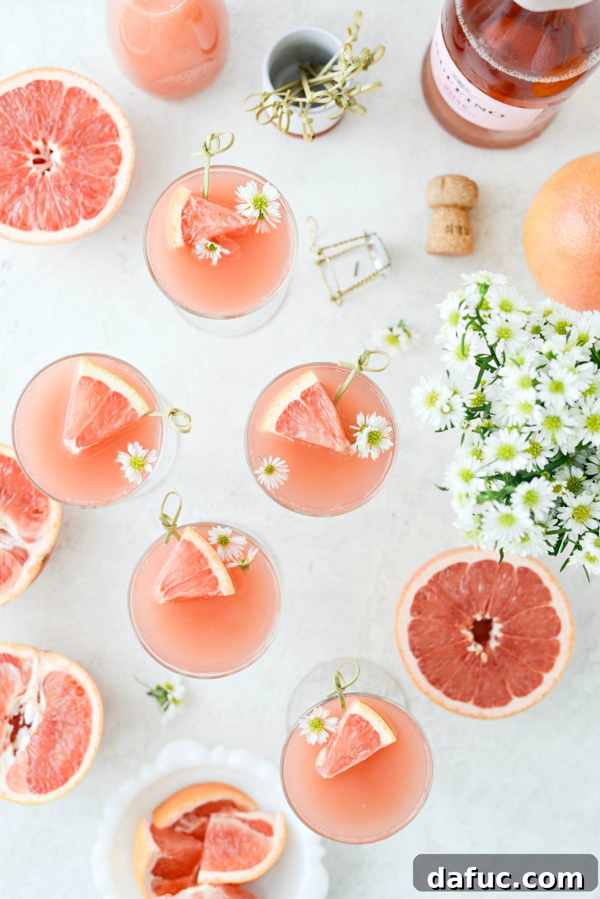 Effervescent Rosé Grapefruit Delight 11 A tray of Grapefruit Rosé Mimosas ready for serving