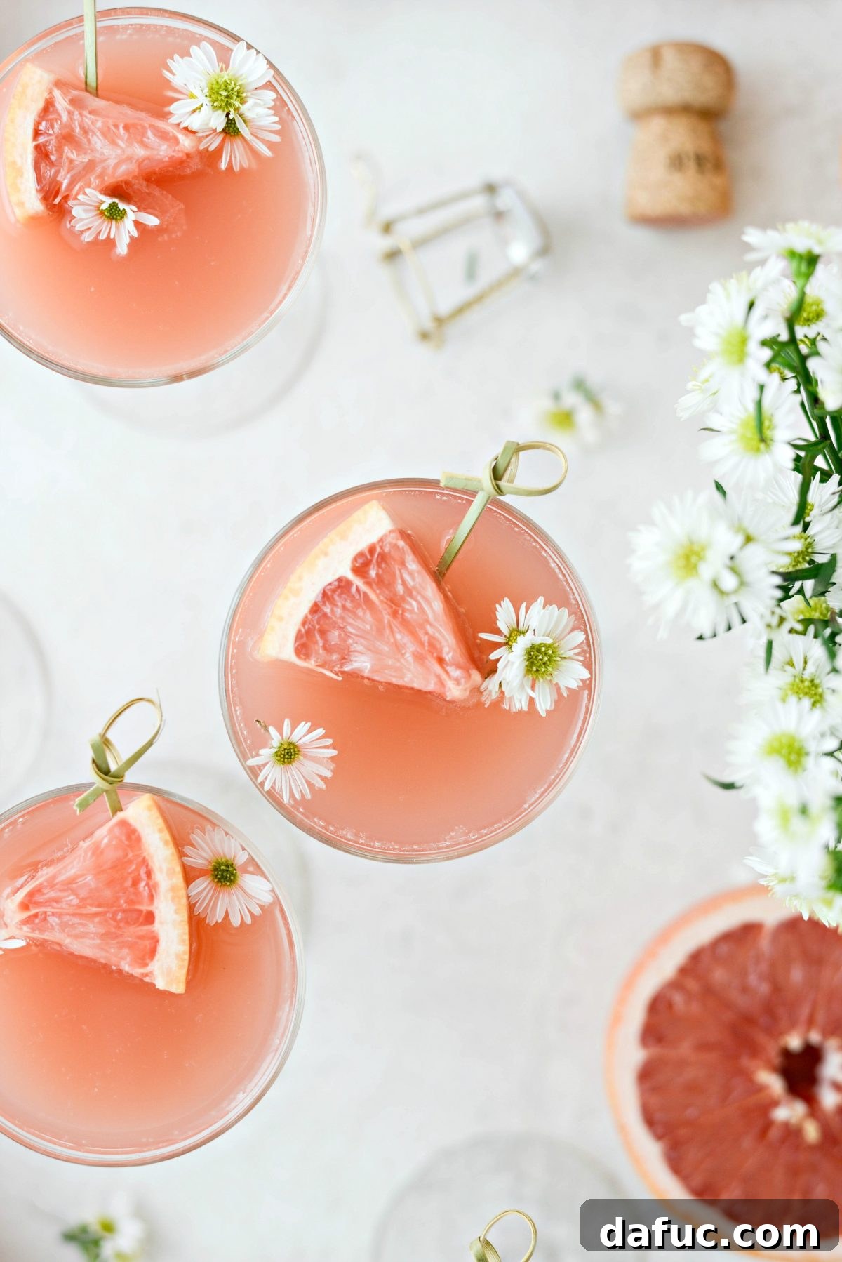 Effervescent Rosé Grapefruit Delight 12 Grapefruit Rosé Mimosas in elegant flutes