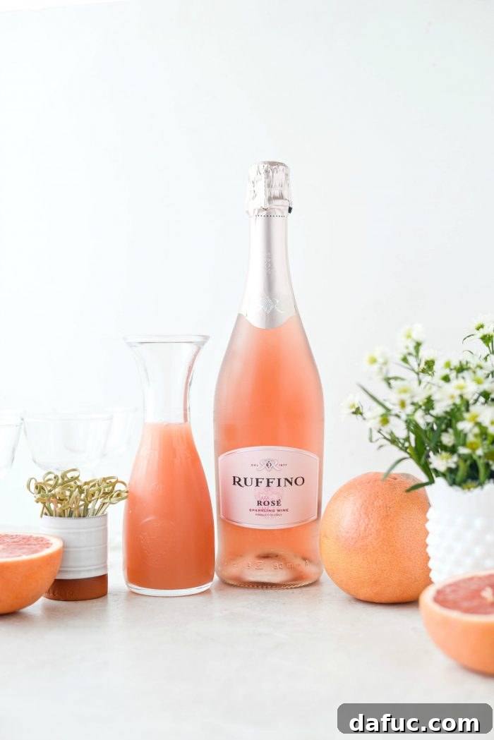 Effervescent Rosé Grapefruit Delight 4 Key ingredients for Grapefruit Rosé Mimosas laid out