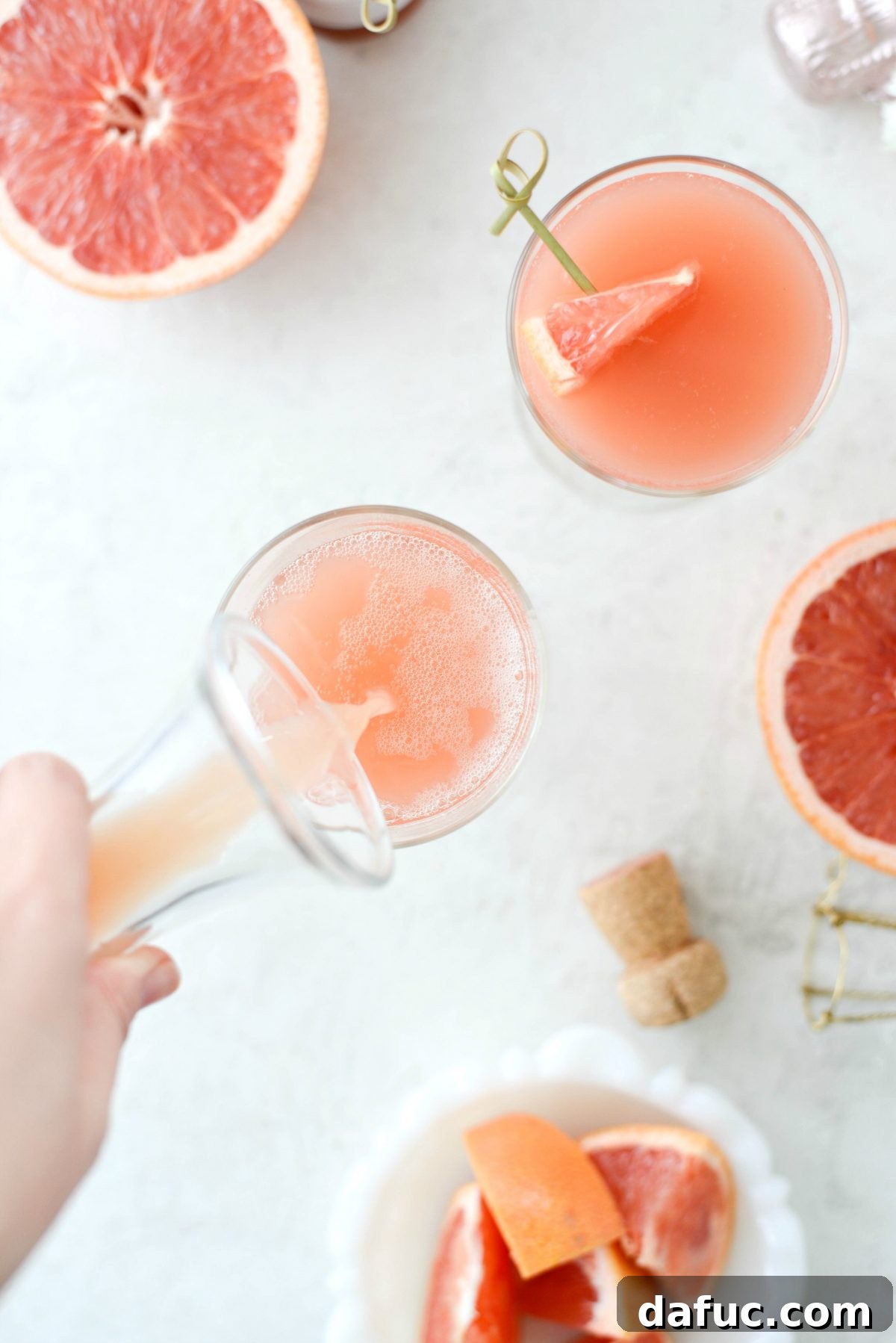 Effervescent Rosé Grapefruit Delight 7 Topping off the mimosa with chilled grapefruit juice