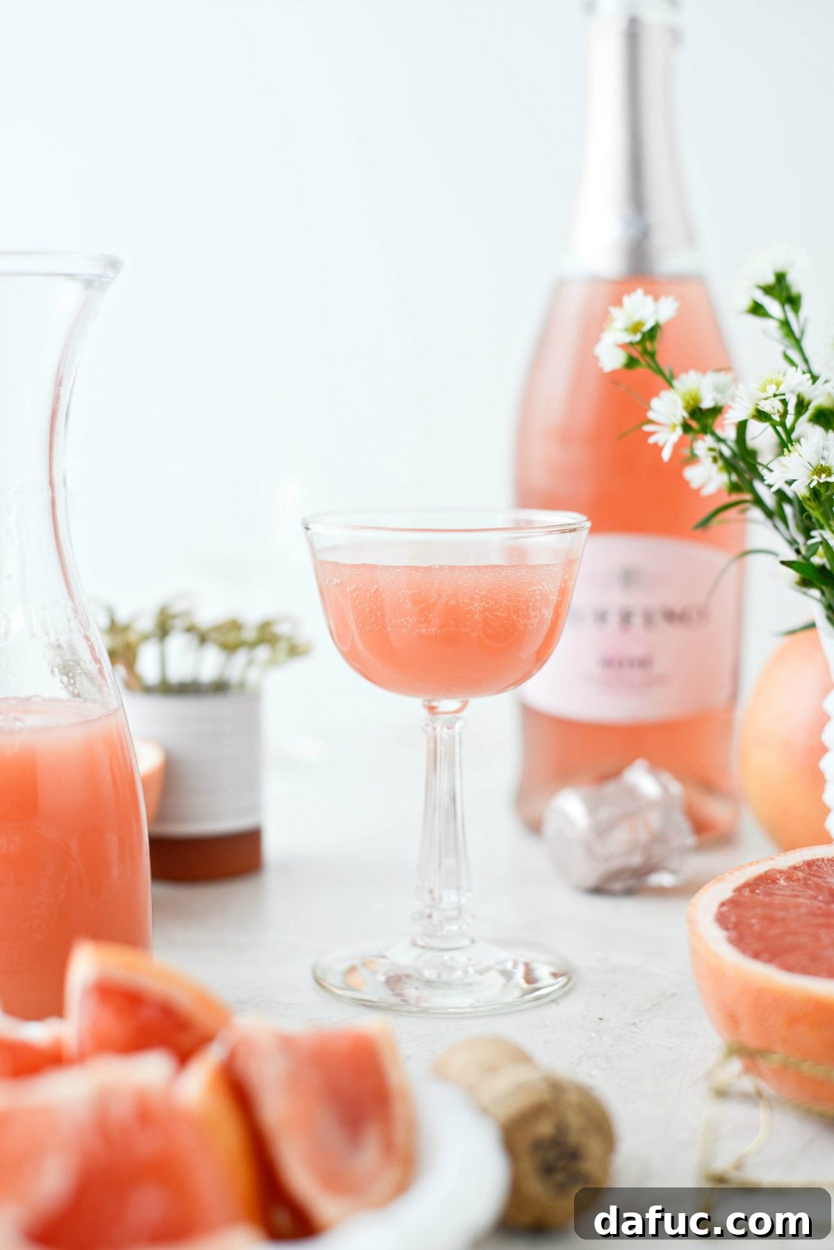 Effervescent Rosé Grapefruit Delight 8 Finished Grapefruit Rosé Mimosas with grapefruit garnish