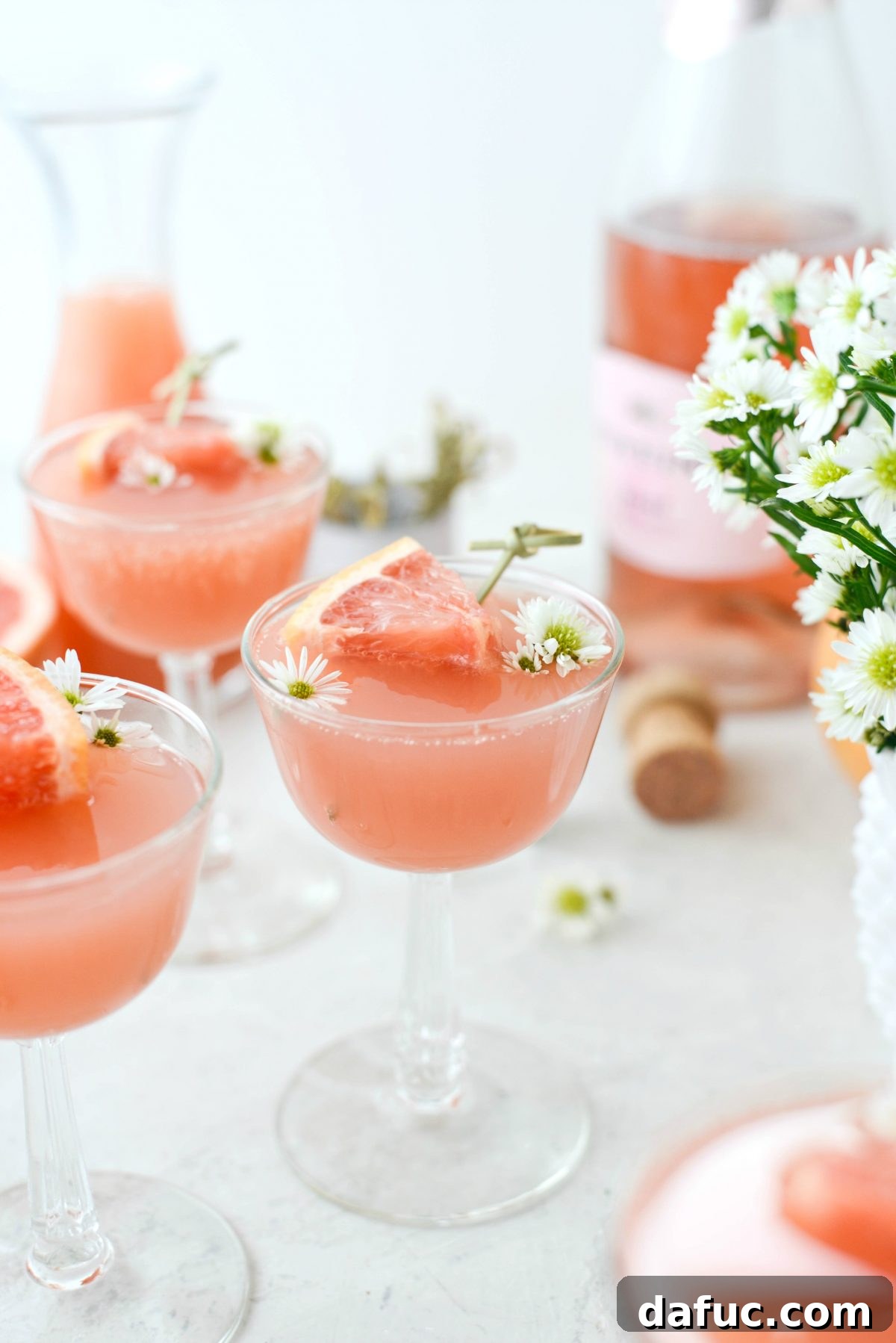Effervescent Rosé Grapefruit Delight 10 Grapefruit Rosé Mimosas served with a grapefruit wedge