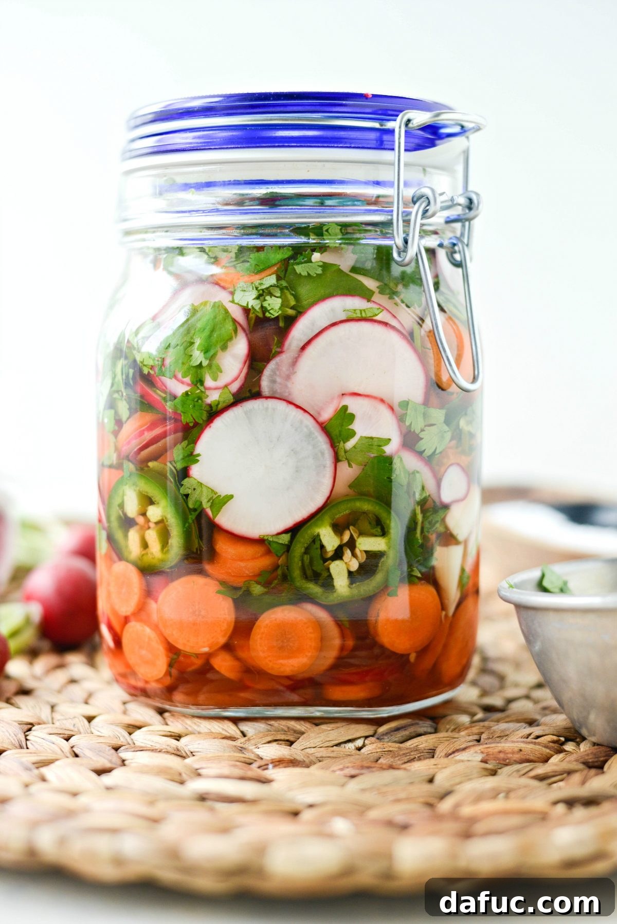 Fermented Firecrackers 12 Sealing a Jar of Spicy Pickled Vegetables