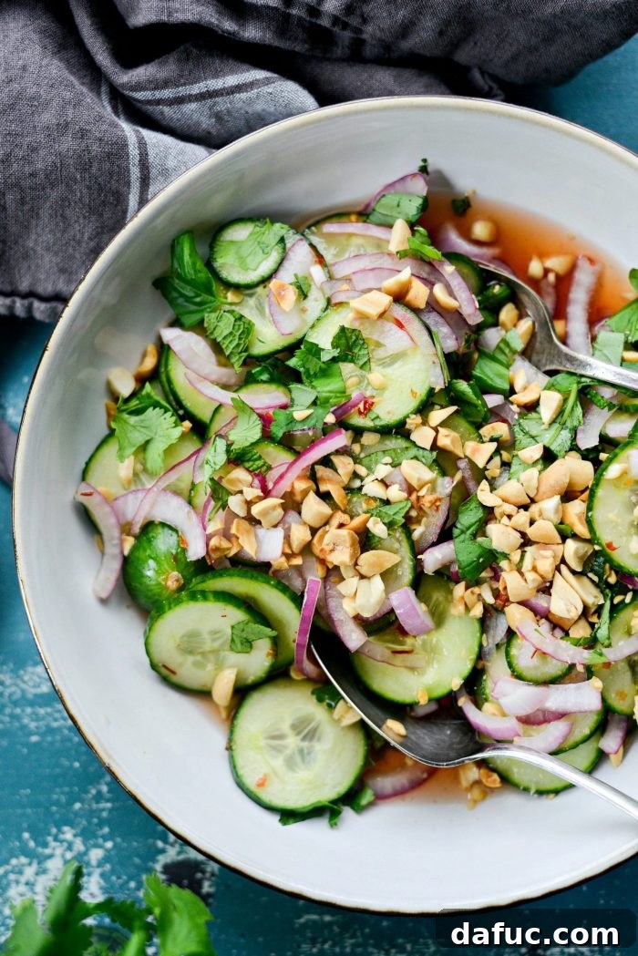 Close-up detailed shot of the vibrant Thai Cucumber Salad