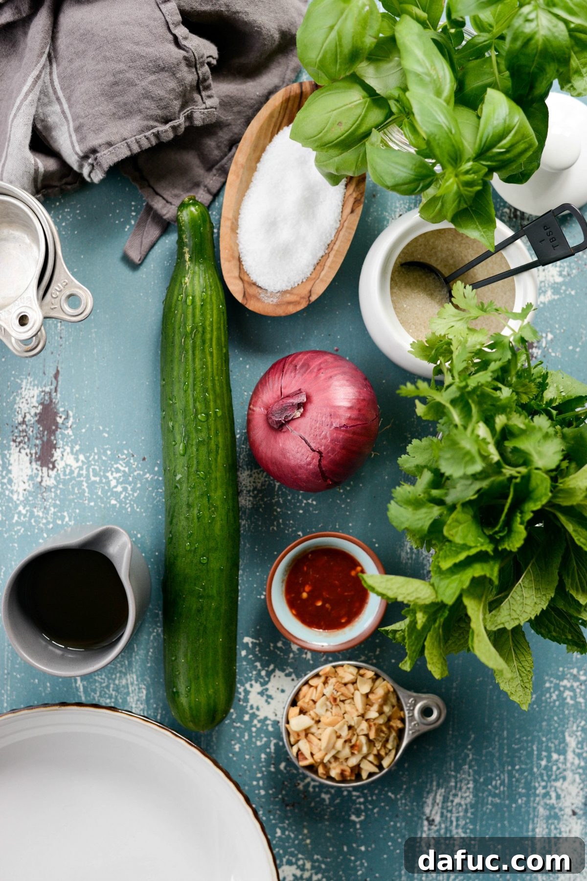 Selection of fresh ingredients laid out for Thai Cucumber Salad preparation