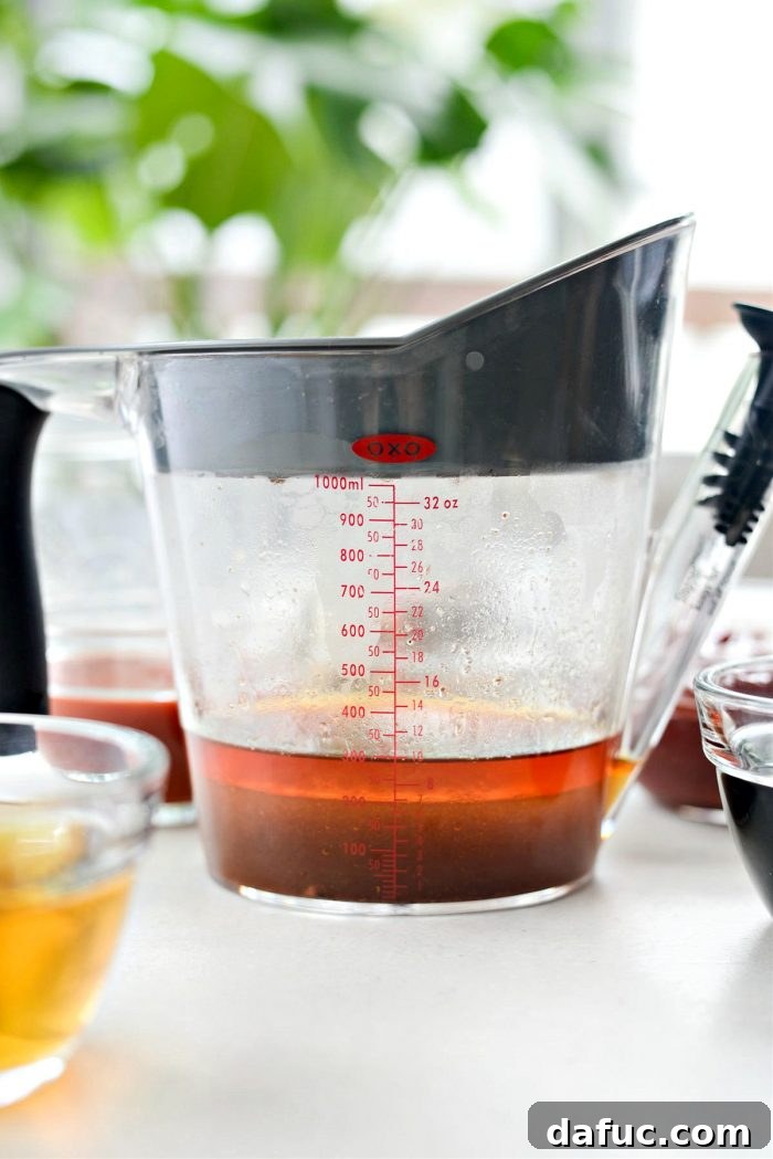 Fat separating from reserved rib cooking liquids