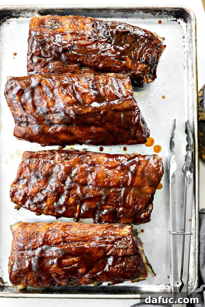 Saucy, oven-baked ribs ready for the grill