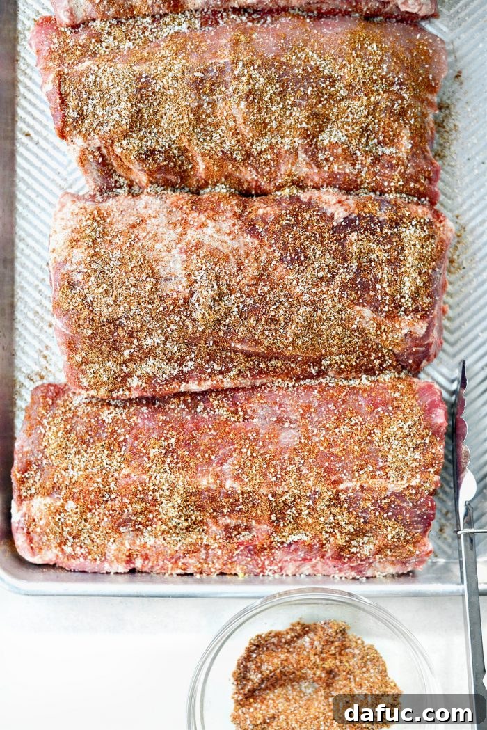 Dry rub massaged into the meaty side of ribs
