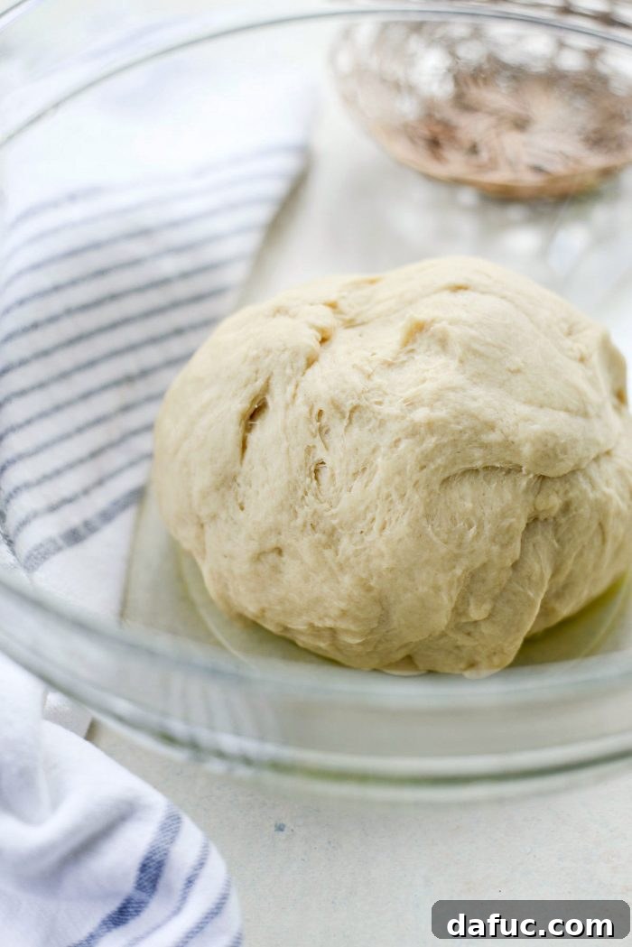 Kneading dough with a dough hook.