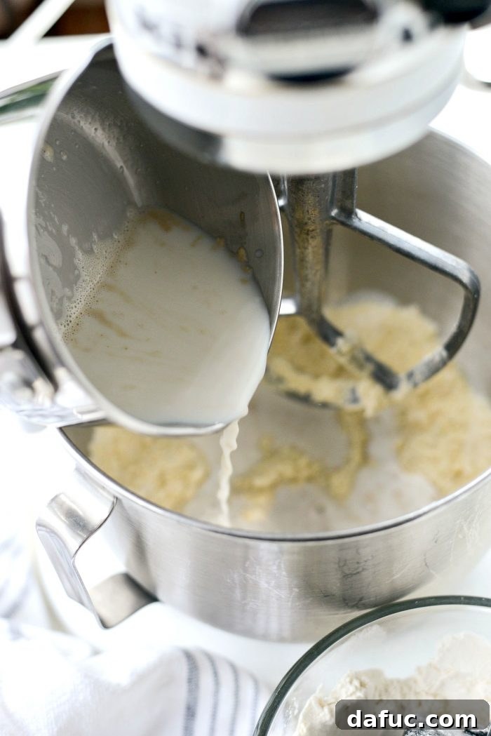 Close-up of wet ingredients in a mixer.