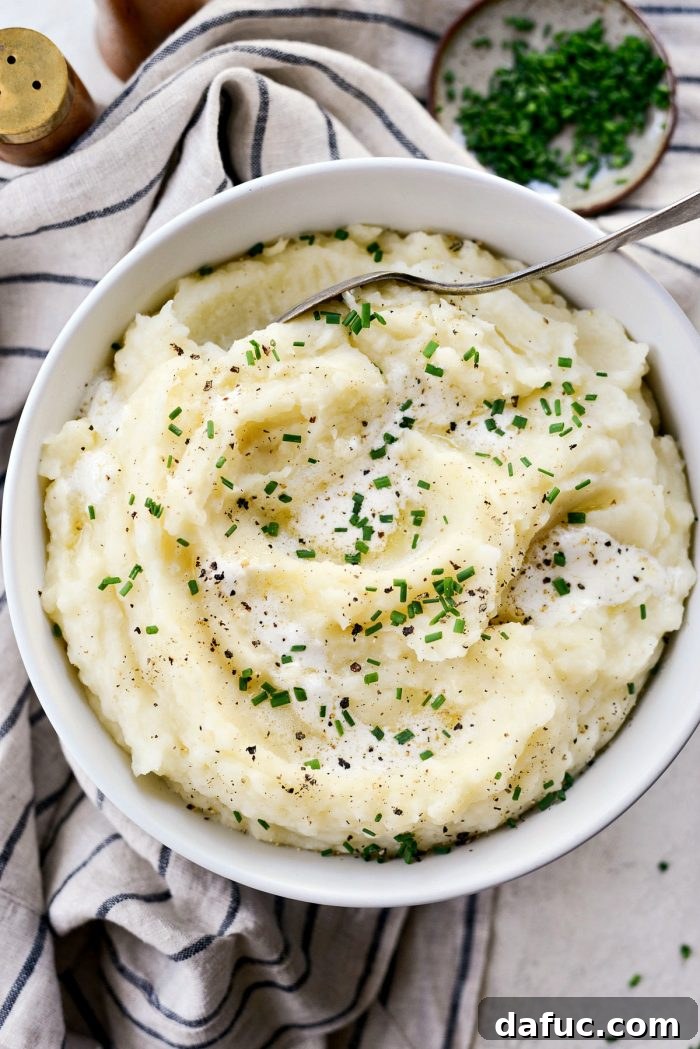Buttermilk Cauliflower Mashed Potatoes l SimplyScratch.com #cauliflower #mashedpotatoes #potatoes #light #buttermilk #sidedish #homemade #fromscratch #easy