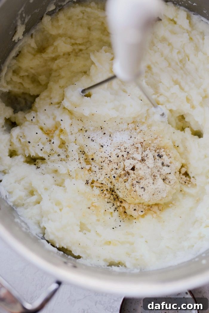 Buttermilk Cauliflower Mashed Potatoes l SimplyScratch.com #cauliflower #mashedpotatoes #potatoes #light #buttermilk #sidedish #homemade #fromscratch #easy