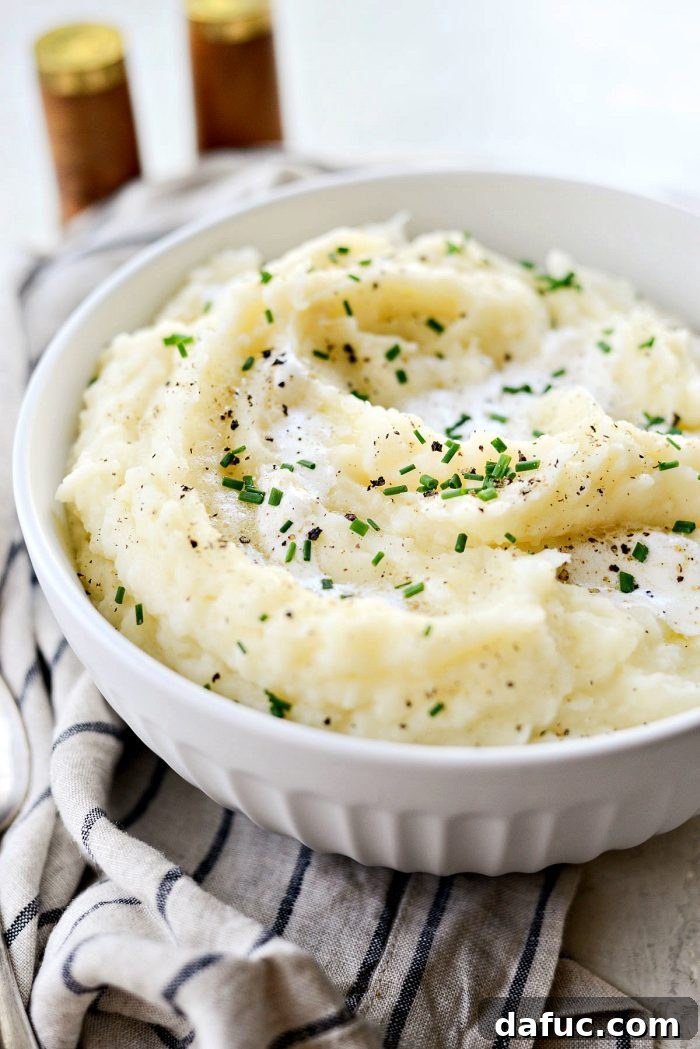 Buttermilk Cauliflower Mashed Potatoes l SimplyScratch.com #cauliflower #mashedpotatoes #potatoes #light #buttermilk #sidedish #homemade #fromscratch #easy