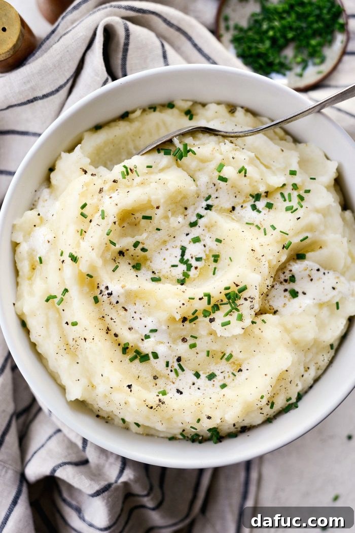 Buttermilk Cauliflower Mashed Potatoes l SimplyScratch.com #cauliflower #mashedpotatoes #potatoes #light #buttermilk #sidedish #homemade #fromscratch #easy