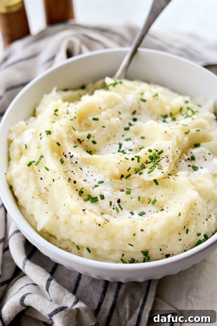 Buttermilk Cauliflower Mashed Potatoes l SimplyScratch.com #cauliflower #mashedpotatoes #potatoes #light #buttermilk #sidedish #homemade #fromscratch #easy
