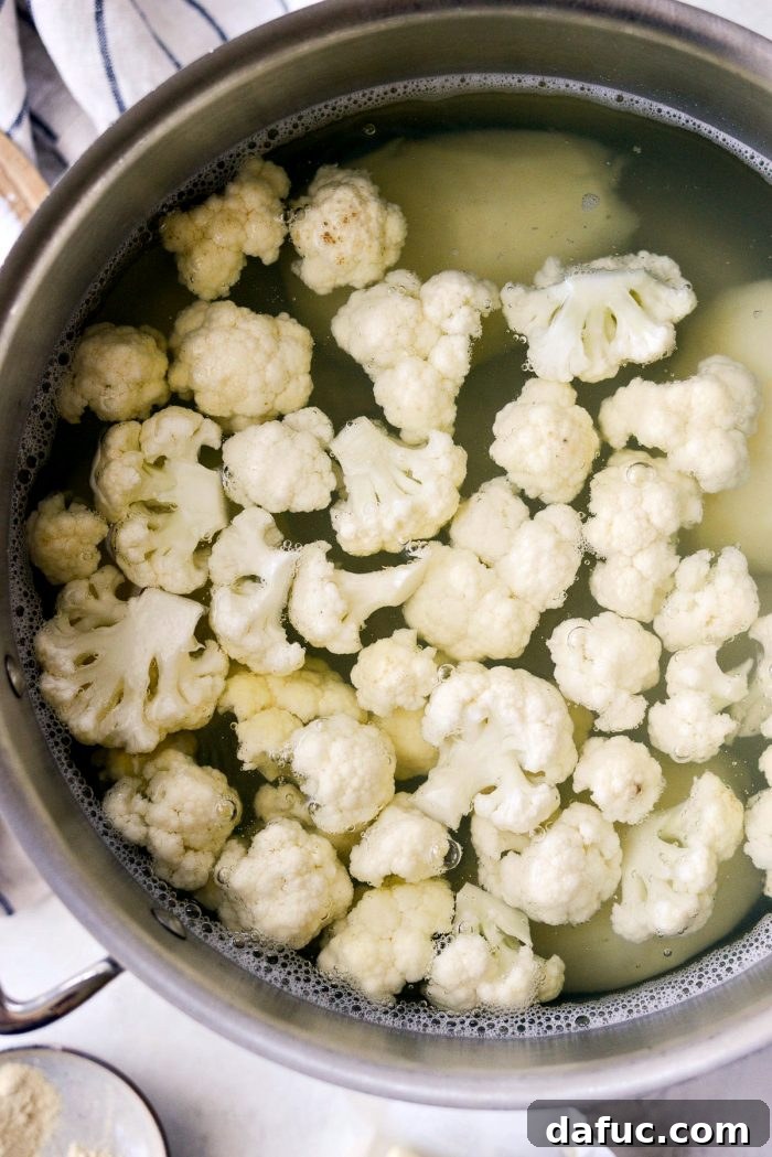 Buttermilk Cauliflower Mashed Potatoes l SimplyScratch.com #cauliflower #mashedpotatoes #potatoes #light #buttermilk #sidedish #homemade #fromscratch #easy