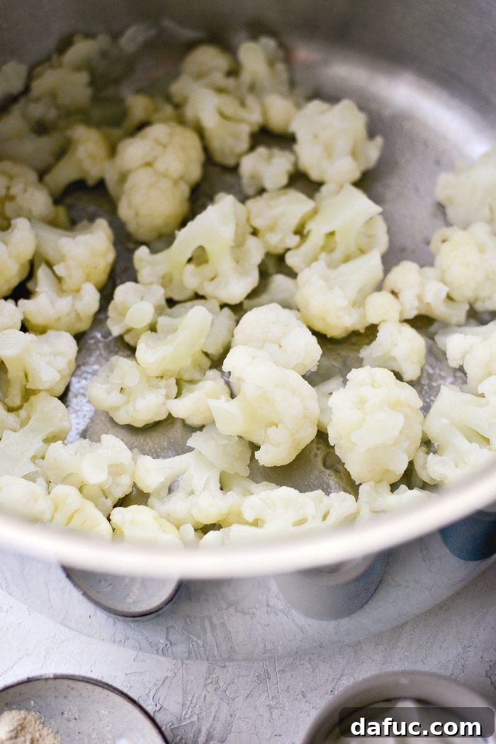 Buttermilk Cauliflower Mashed Potatoes l SimplyScratch.com #cauliflower #mashedpotatoes #potatoes #light #buttermilk #sidedish #homemade #fromscratch #easy