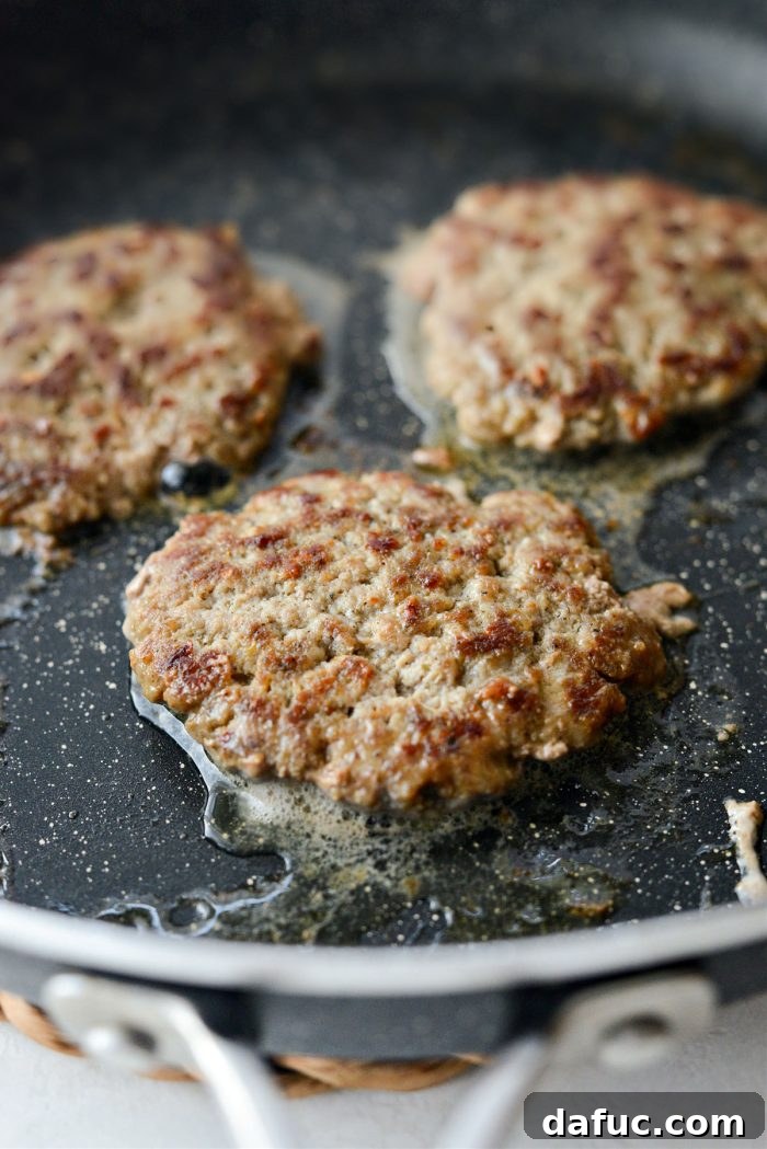 Hearty Sausage Egg and Cheese Breakfast Melts 15 Cooked turkey sausage patties in the pan