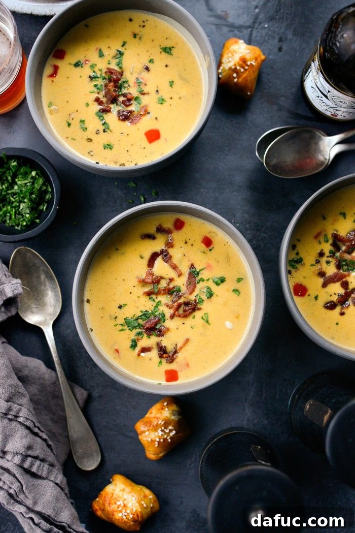 Harvest Ale & Creamy Cheddar Pumpkin Soup 17 Finishing touches: Pumpkin Beer Cheese Soup seasoned to perfection, ready to be served.