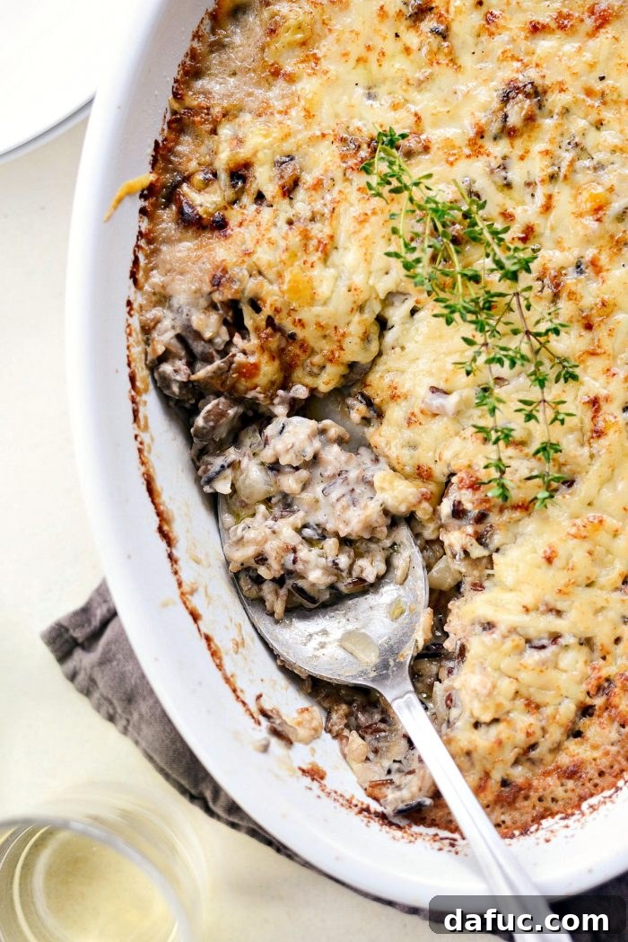Hearty Mushroom Wild Rice Bake 19 The Mushroom Wild Rice Casserole showcased in a beautiful table setting.