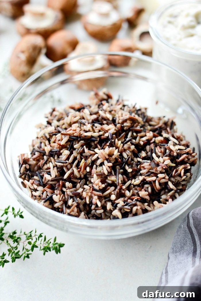 Hearty Mushroom Wild Rice Bake 4 Cooked wild rice blend in a bowl, ready to be incorporated into the casserole.