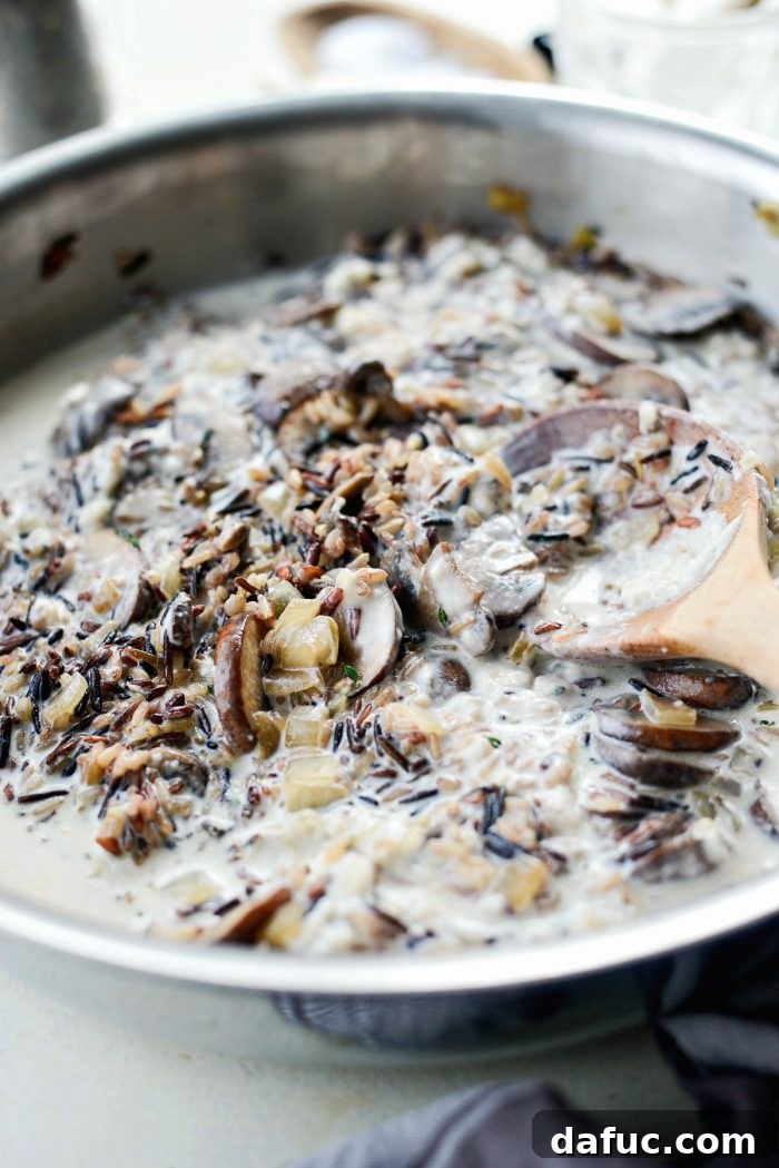 Hearty Mushroom Wild Rice Bake 9 Ingredients for the casserole sauce, including homemade cream of mushroom soup base, vegetable broth, and heavy cream.