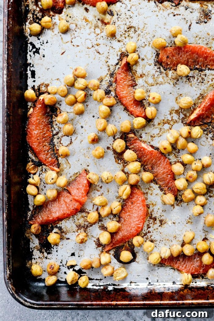 Grapefruit and chickpeas seasoned and ready for roasting.