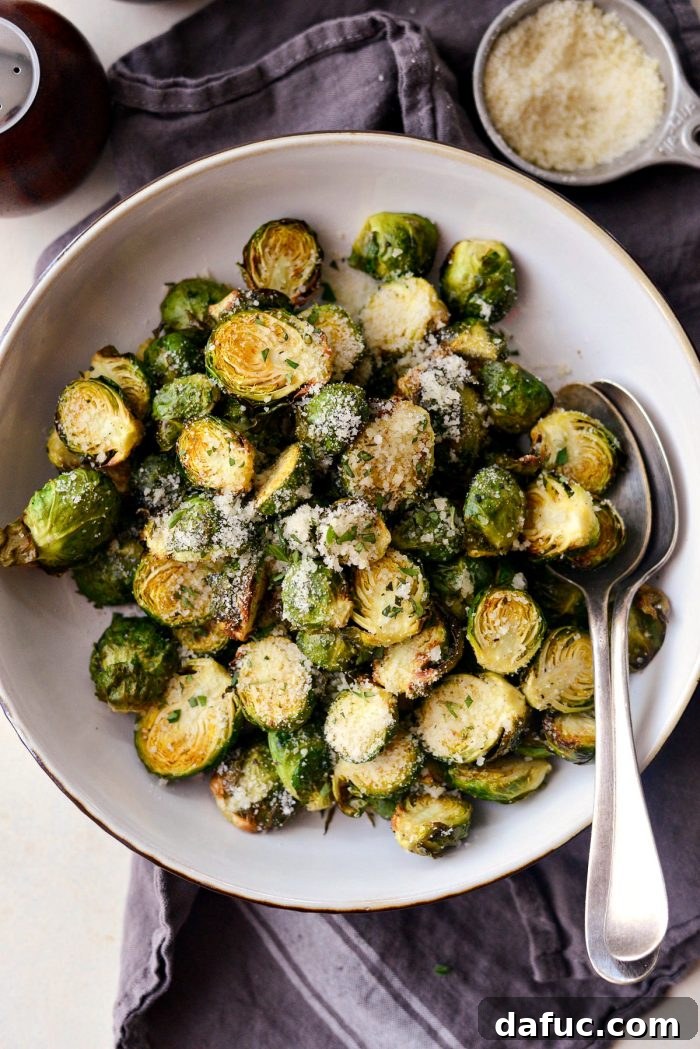 Final shot of Air Fryer Brussels Sprouts on a wooden board, ready to be enjoyed.