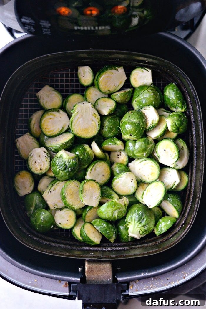 Brussels sprouts cooking in the air fryer.