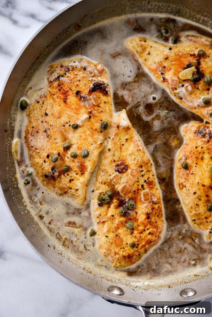 Bright & Healthy Chicken Piccata 12 Adding chicken, butter, and capers to the sauce